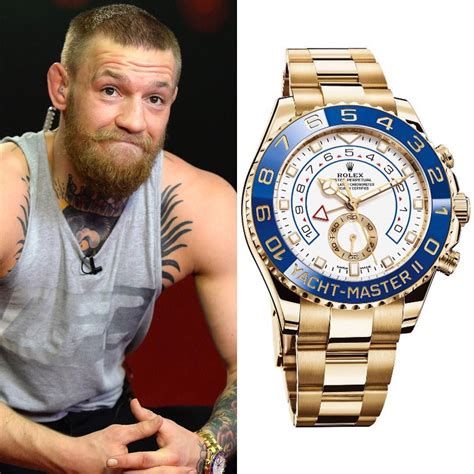 conor mcgregor suit and rolex.